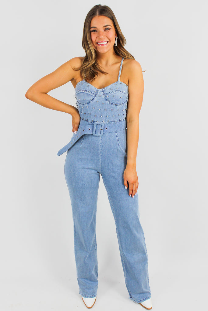 denim belted jumpsuit with a rhinestone studded bustier top