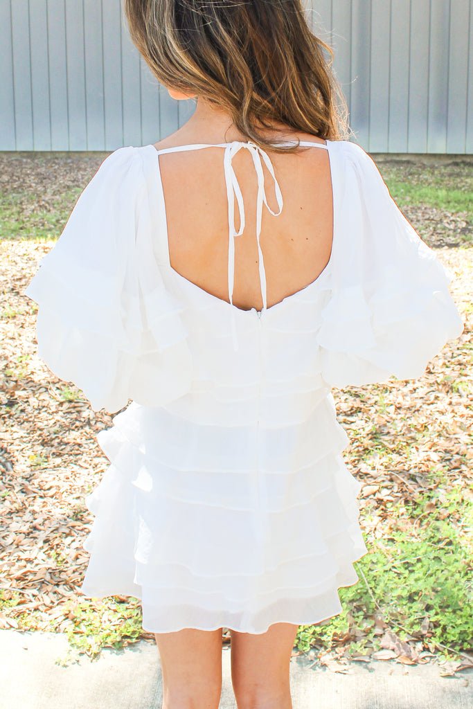 white puff sleeve dress with ruffle tiers