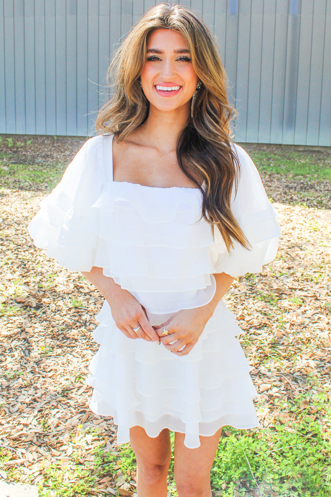 white puff sleeve dress with ruffle tiers