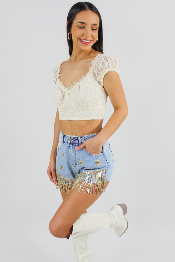 cream colored crop top with floral lace detail