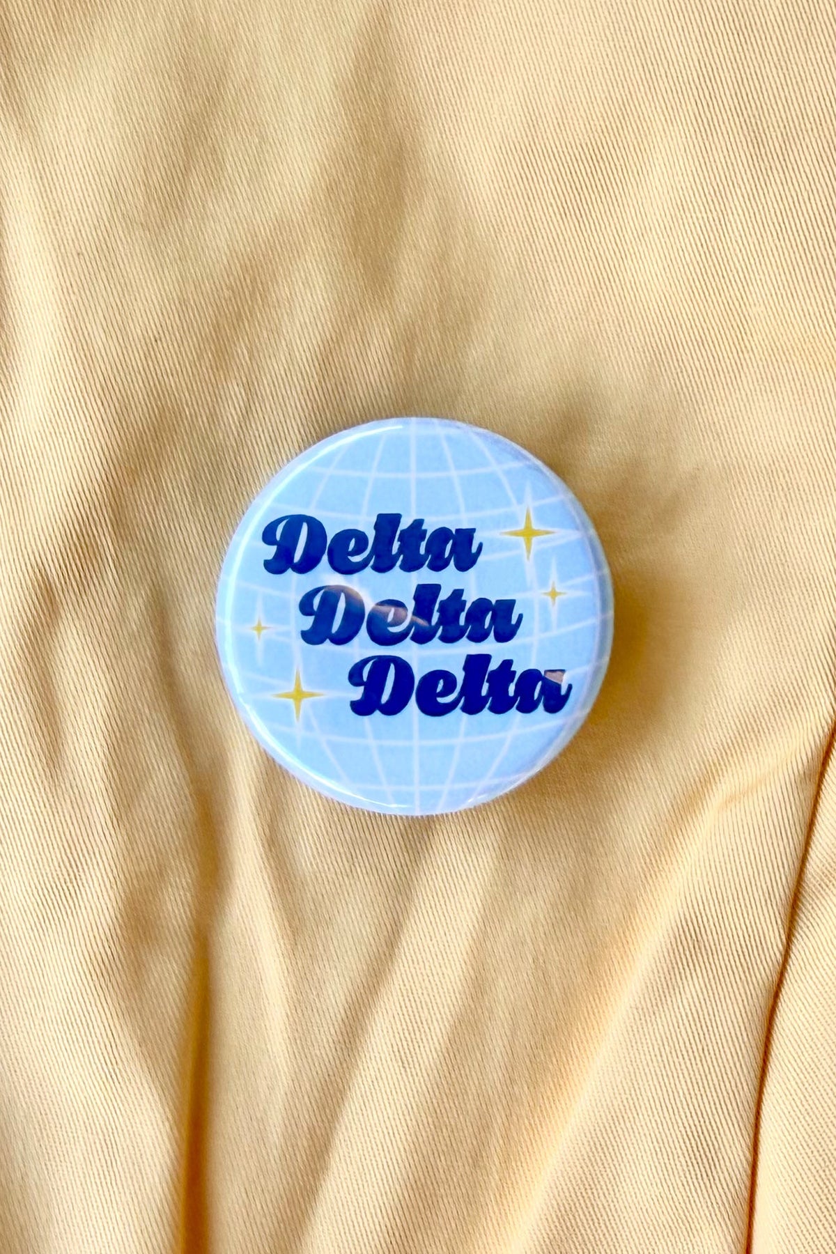 Delta Delta Delta Disco Greek Mini Gameday Button in Light Blue