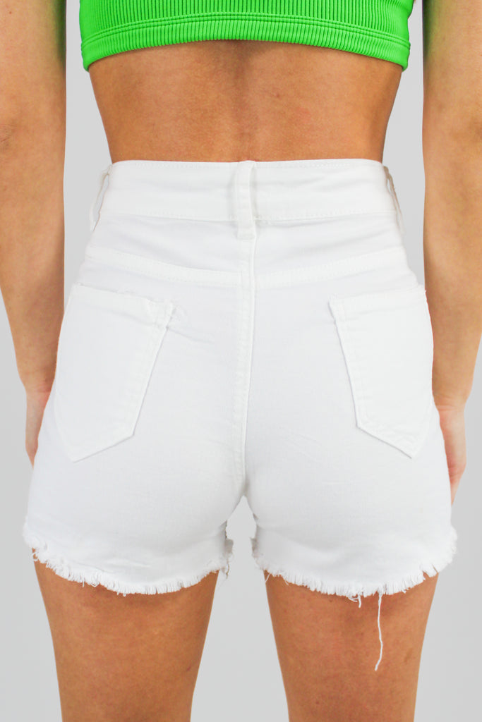 white denim shorts with rhinestone studs throughout