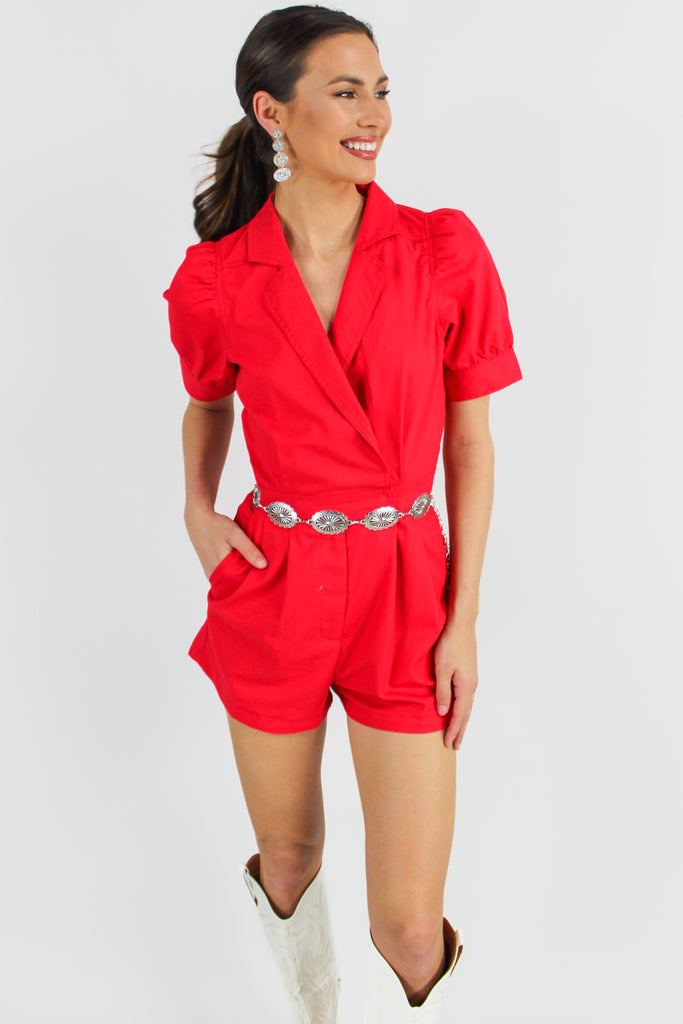 red denim romper with puff sleeves and a blazer style neckline 