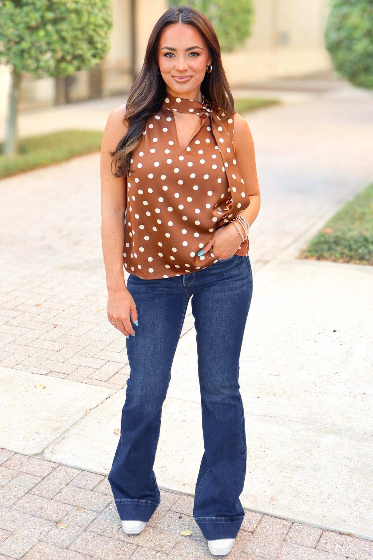 Caramel polka dot halter top with brooch detail
