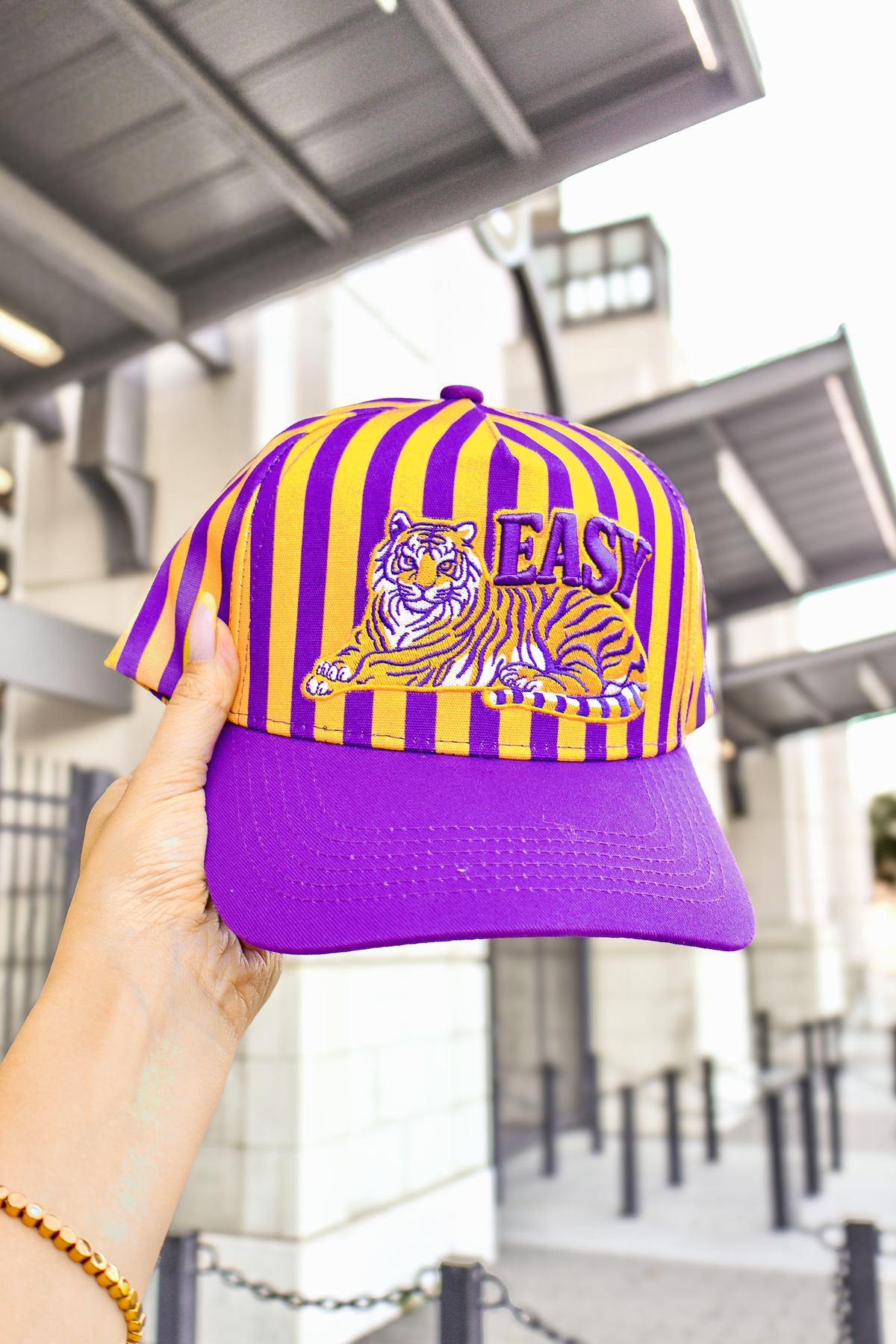 Purple and gold tiger stripe trucker hat with snapback