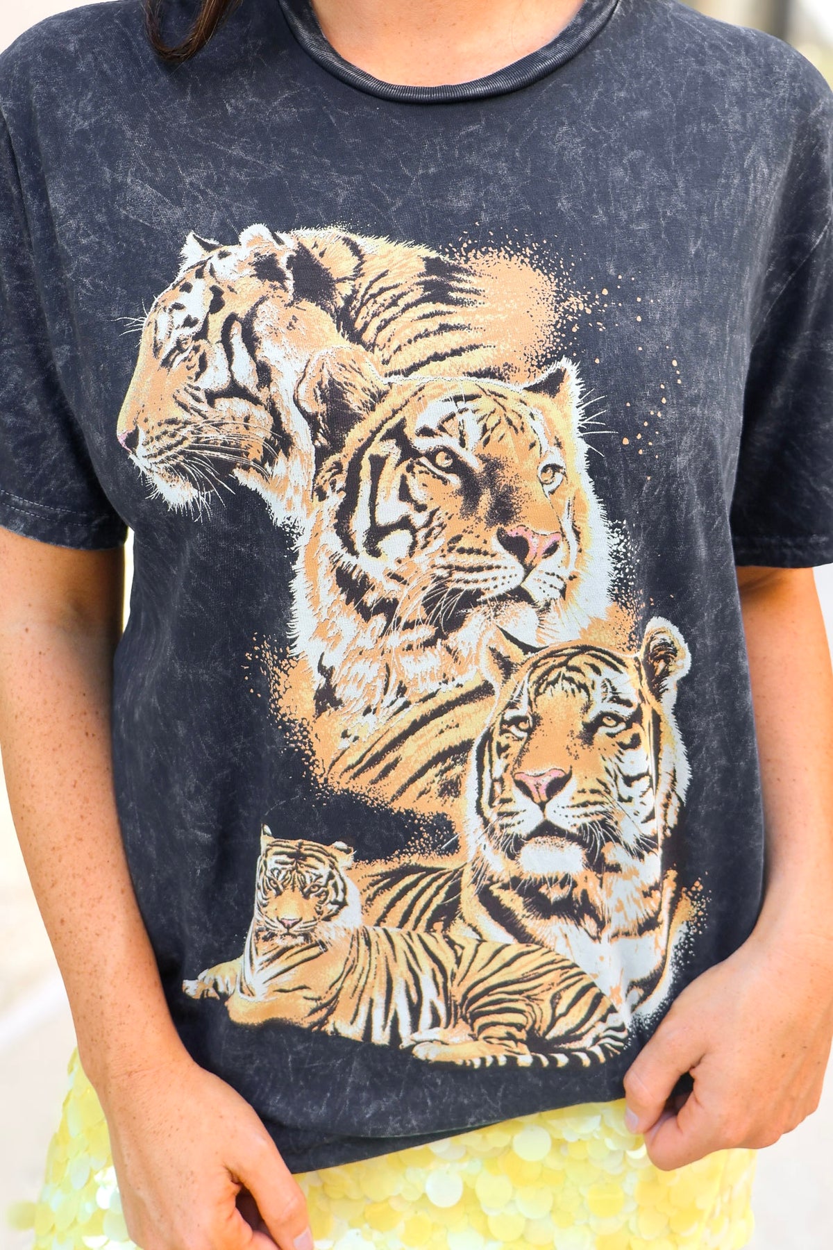 Close-up of the tiger graphic on the black vintage washed tee