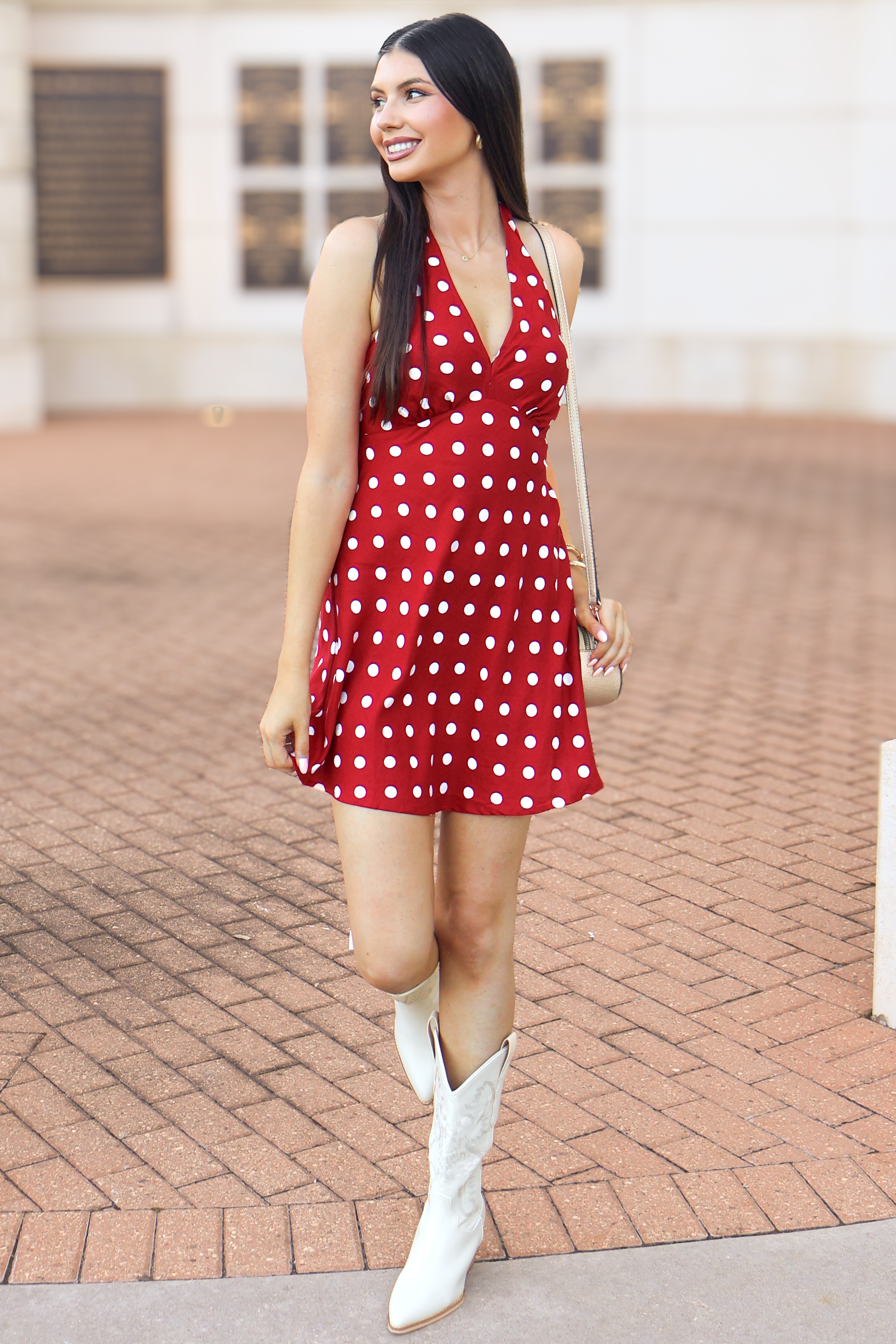 Red polka dot halter mini dress with tie back