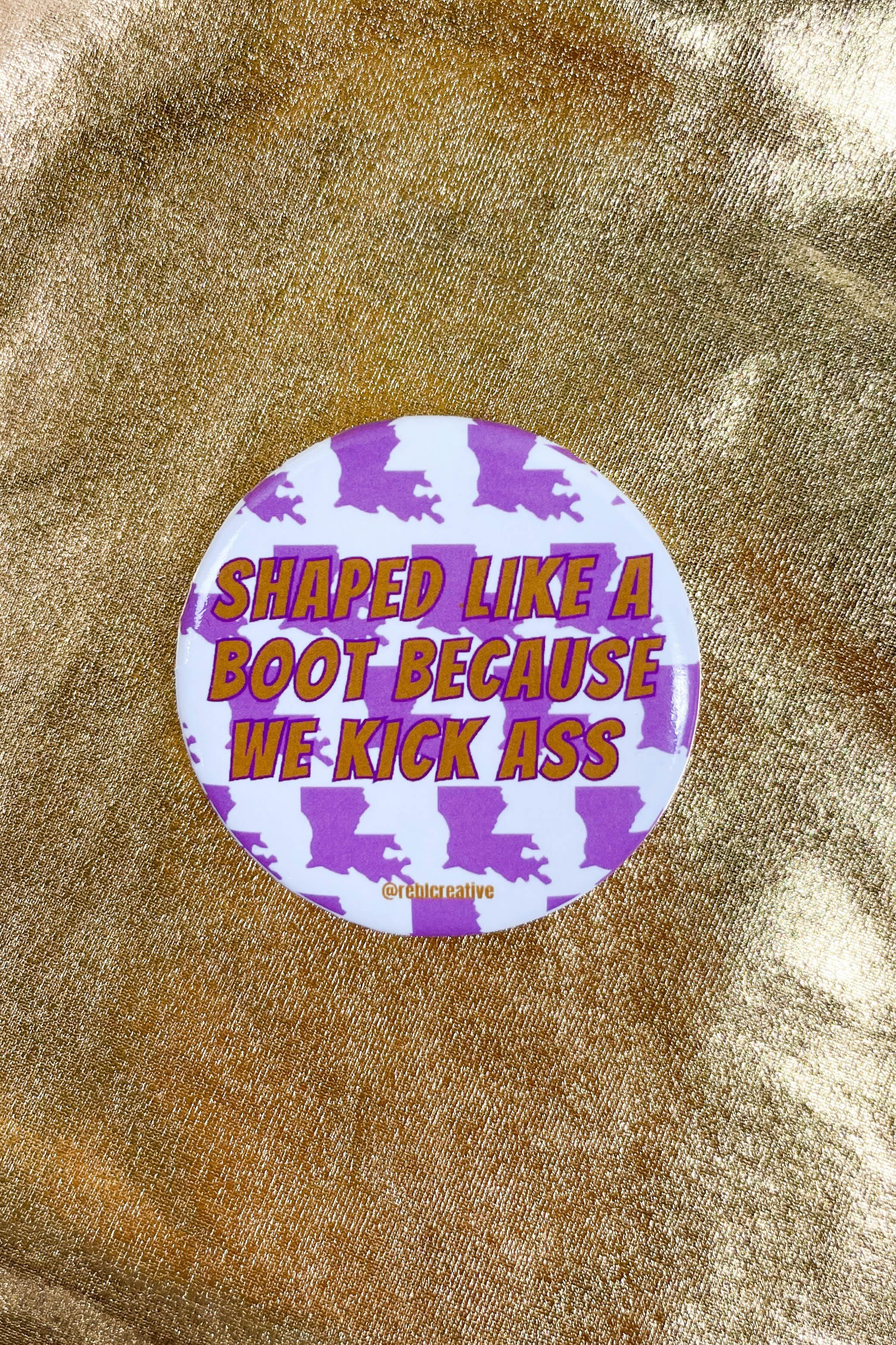 Purple and white Shaped Like a Boot gameday button