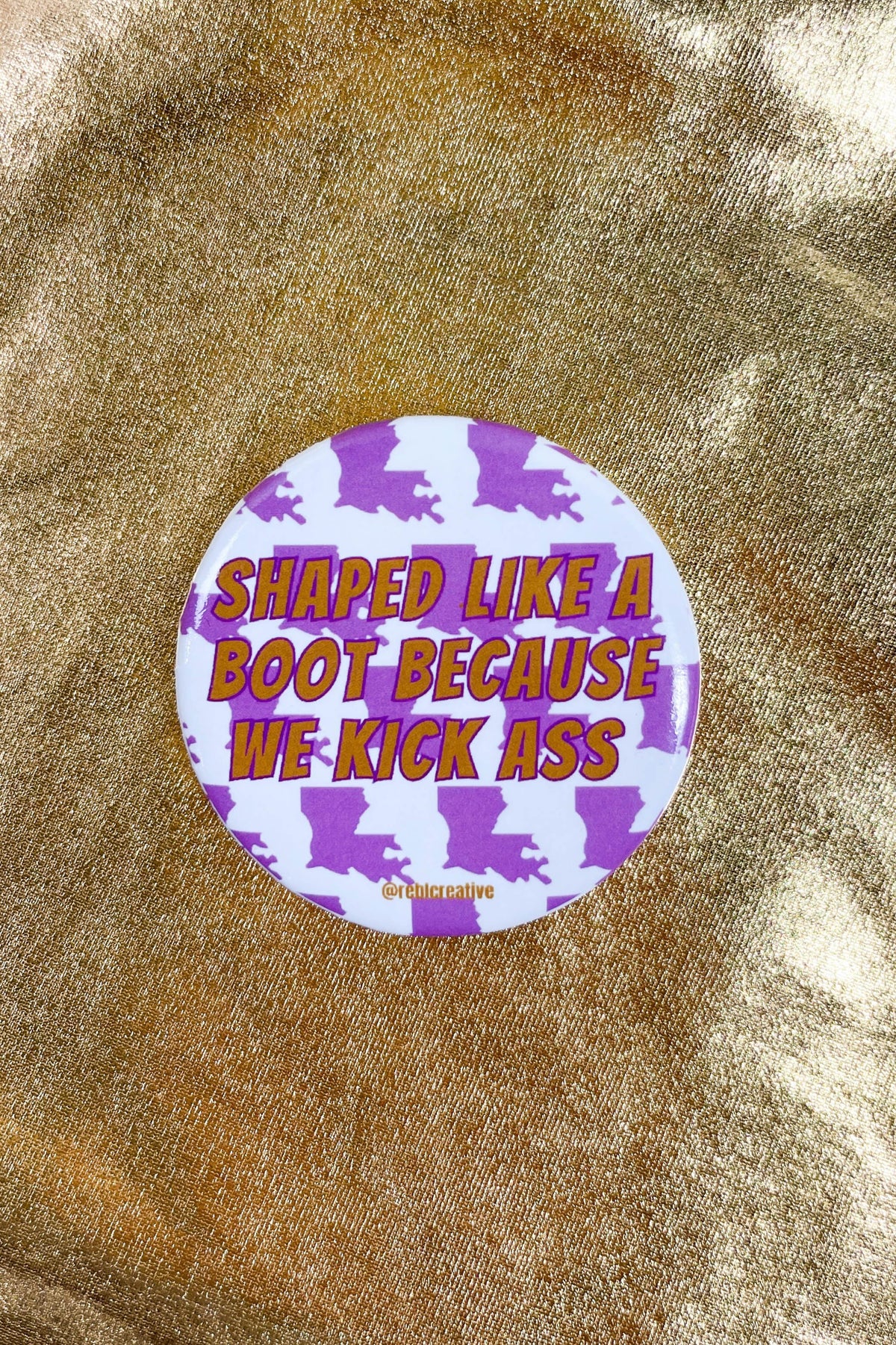 Purple and white Shaped Like a Boot gameday button