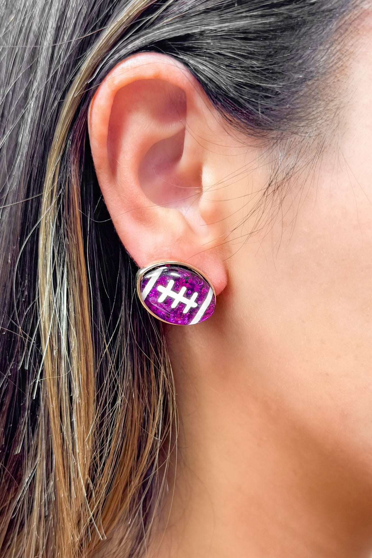 Football dazzle earring 