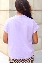 Flower Football Tee by Queen of Sparkles in Lavender-TOP ALL LSU