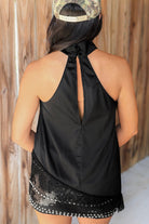 At Any Level Asymmetrical Lace Hem Halter Top in Black - back view