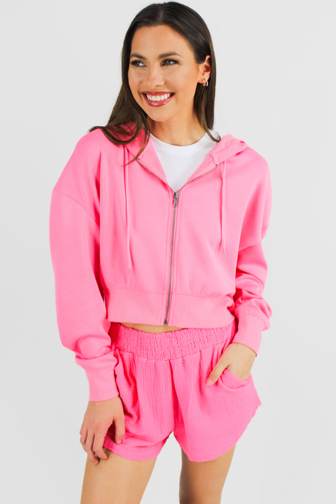 hot pink athletic full-zip cropped jacket shown zipped