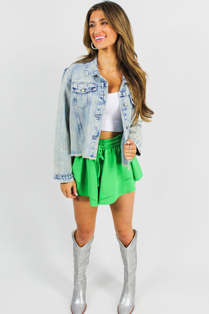 Alternate image of jacket paired with a white tank and green shorts