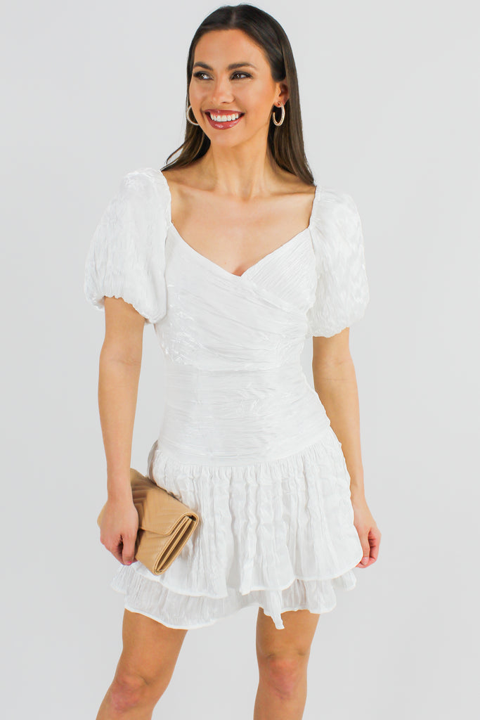 front view of white satin puff sleeve dress
