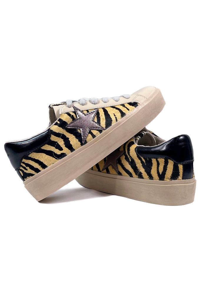 Tiger stripe platfirm sneakers with pewter star on the side