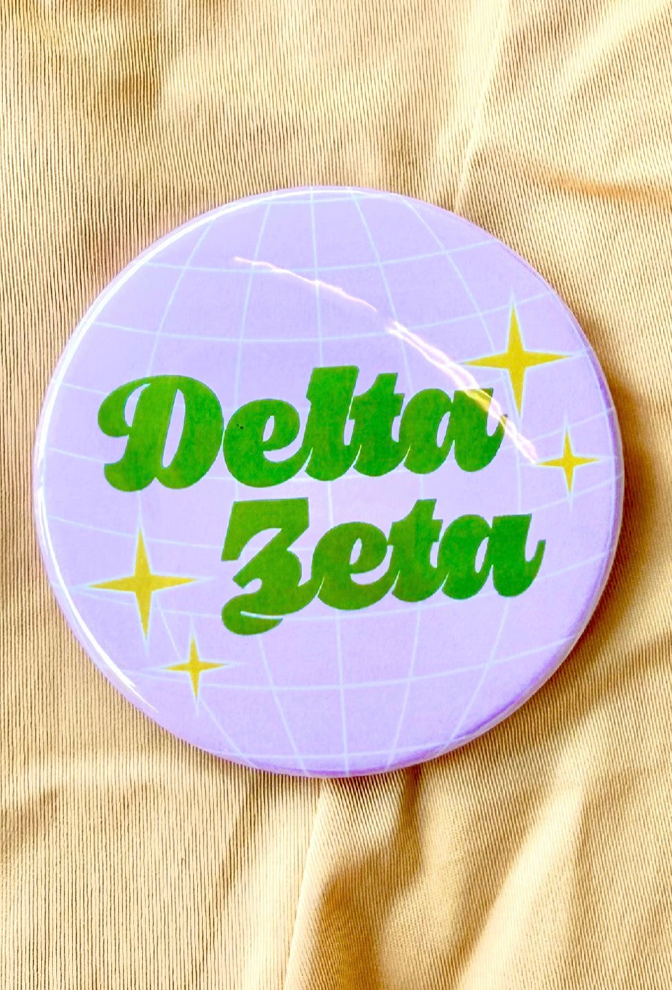 Delta Zeta Disco Greek Gameday Button close-up