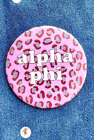 Alpha Phi Leopard Greek Gameday Button close-up