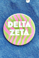Delta Zeta Zebra Greek Gameday Button close-up