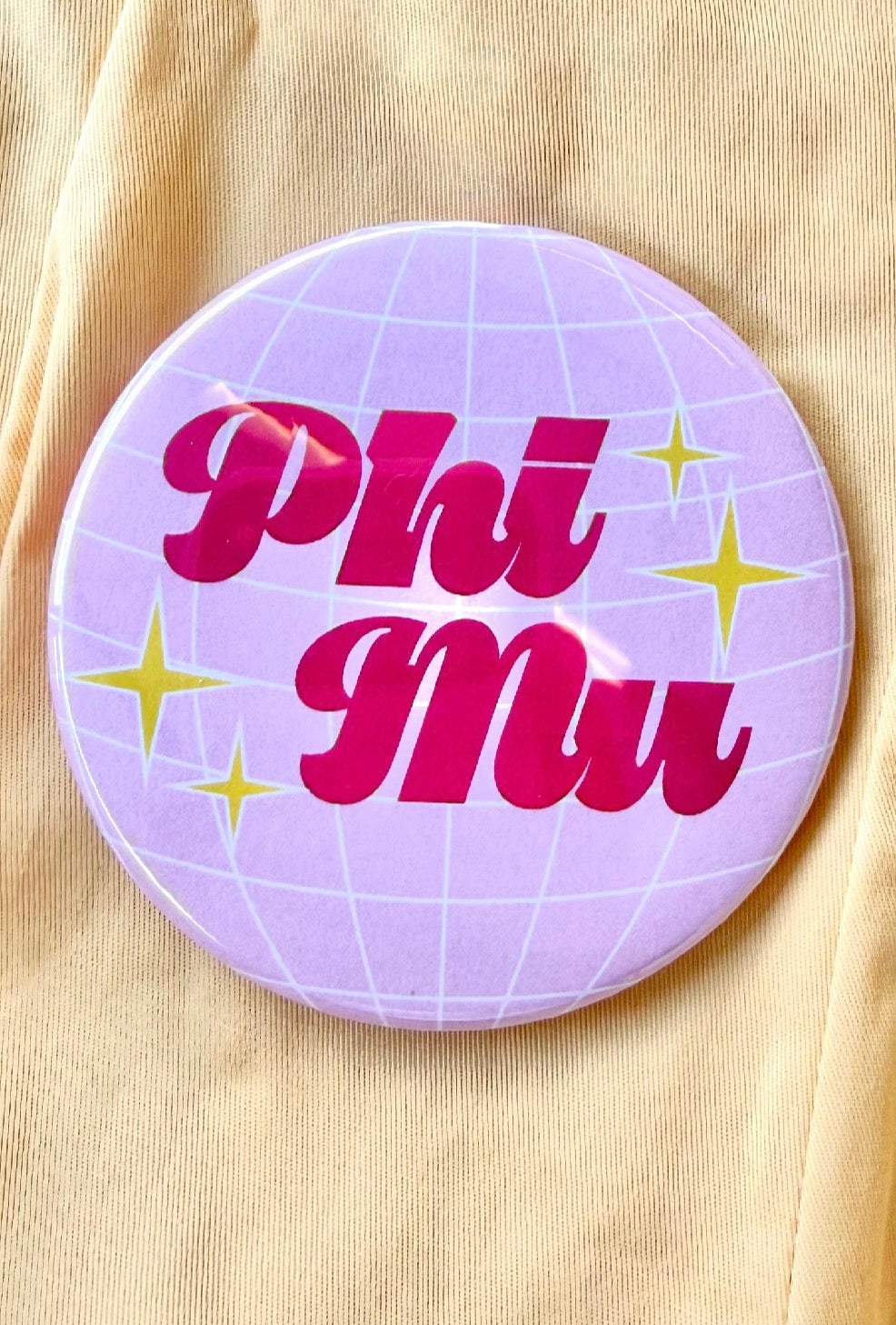 Phi Mu Disco Greek Gameday Button close-up