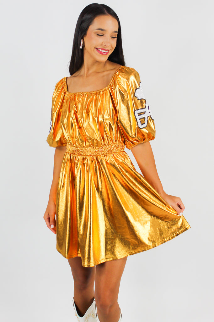 game on metallic dress