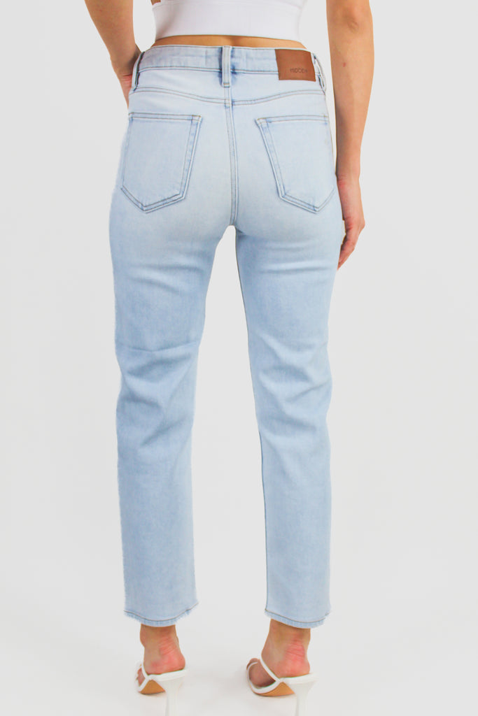 back view of light denim high rise straight leg cropped jeans 