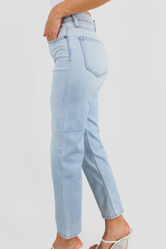 side view of light denim high rise straight leg cropped jeans 