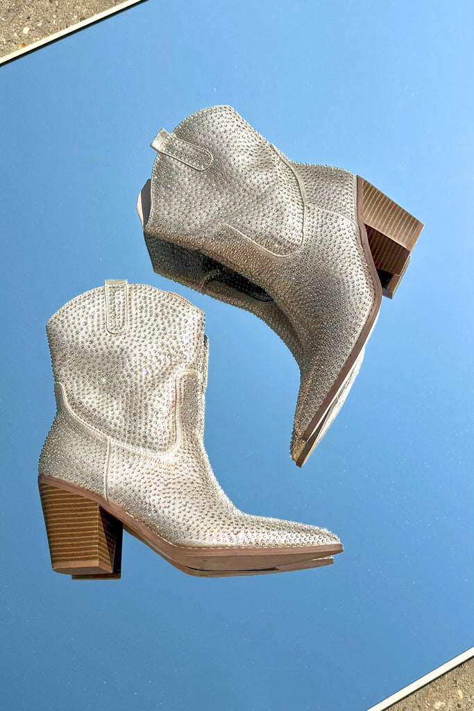 pointed toe rhinestone covered western booties in gold