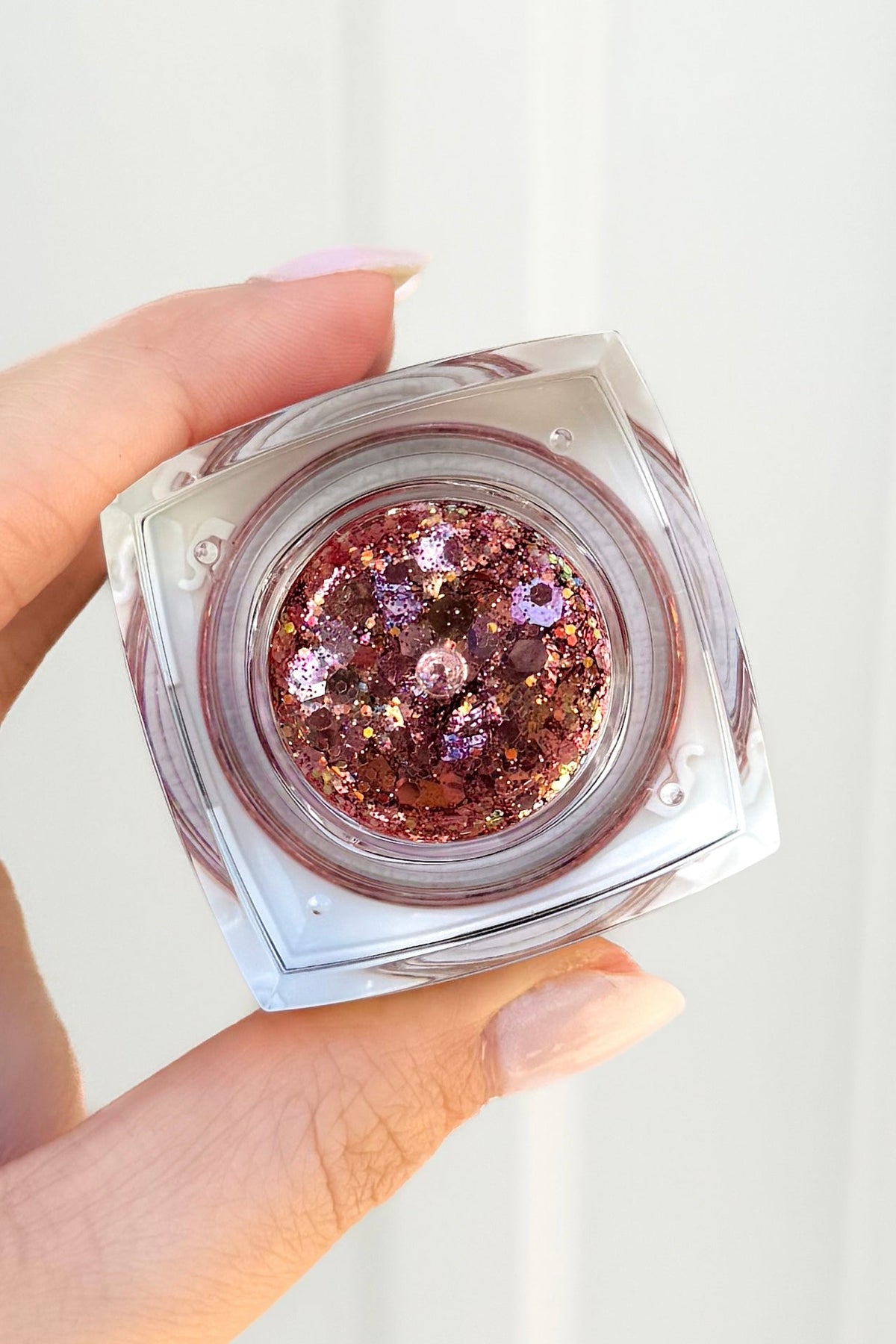 Golden Rosé Glitter Balm by Elektra Cosmetics in Rose Gold