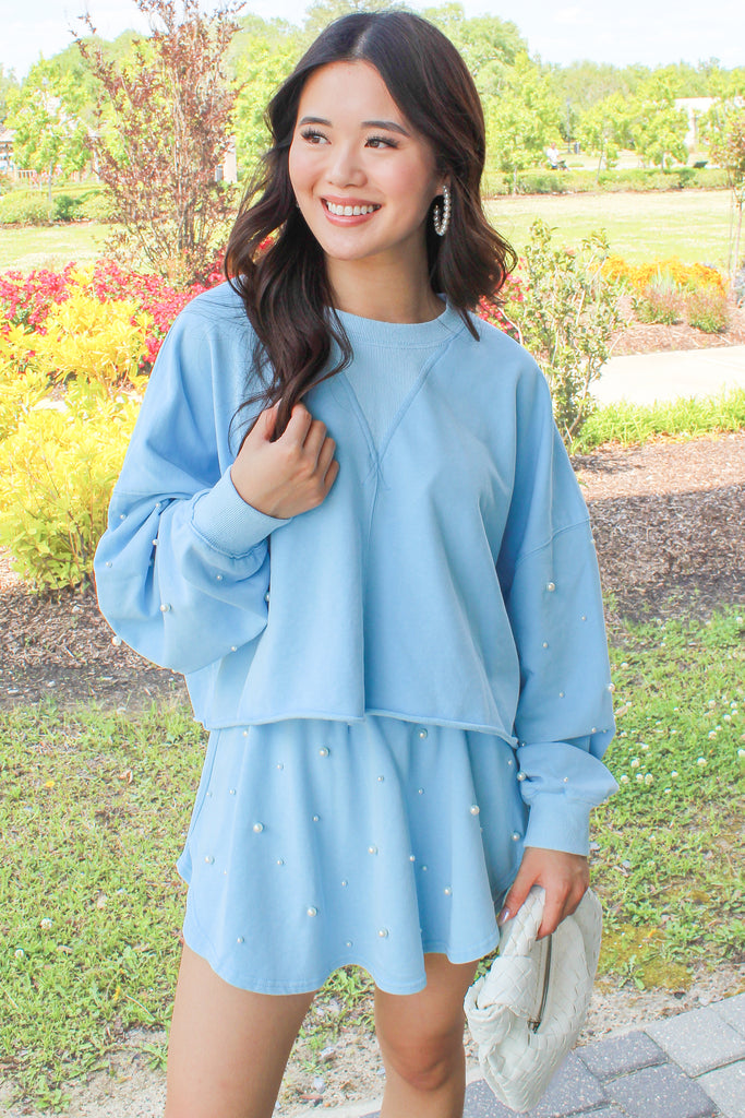 light blue cotton cropped sweatshirt with pearl embellished sleeves
