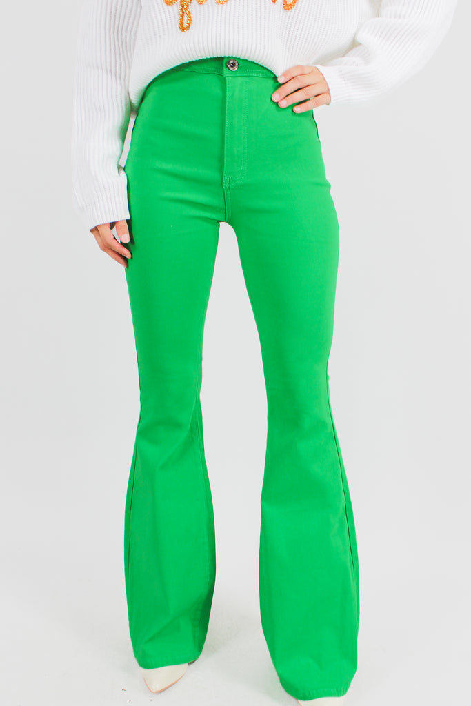 green flare jeans