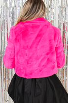 Hot pink faux fur cropped jacket, back view
