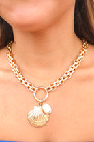 Gold shell and pearl charm chain necklace