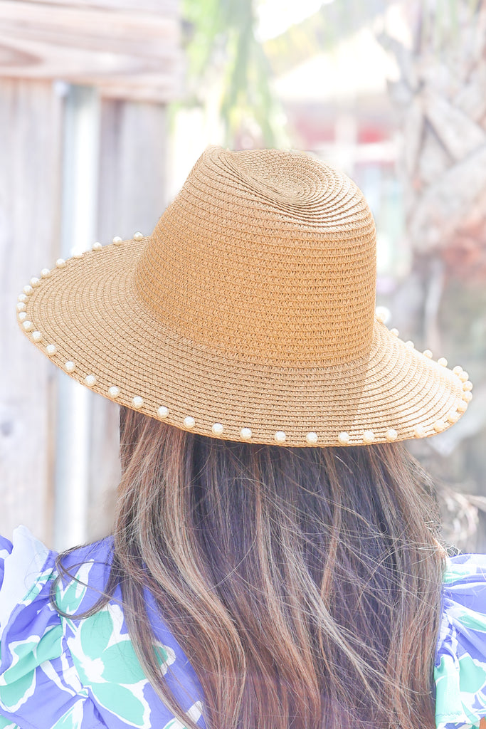 pearl lined straw hat