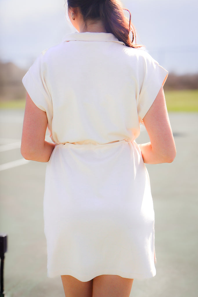 back of cream dress