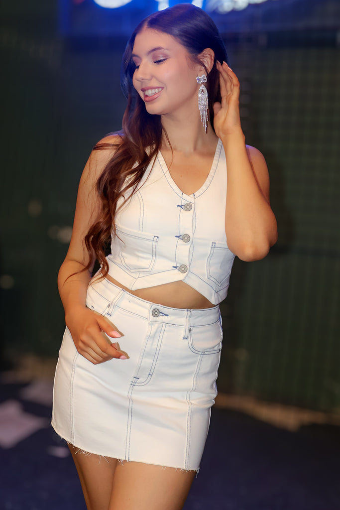 white denim cropped vest with dark blue stitching