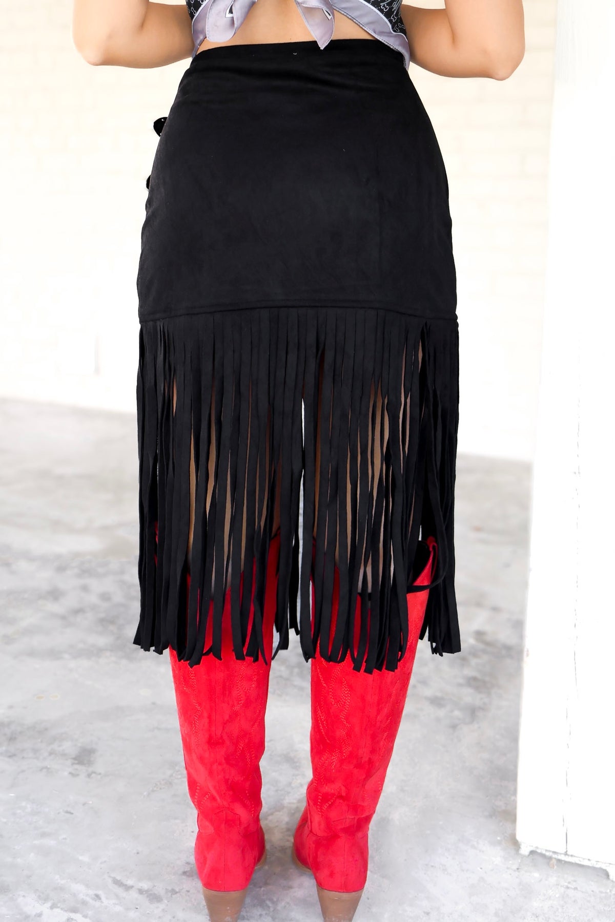 Take Me Away Suede Fringe Buckle Skirt in Black - back view