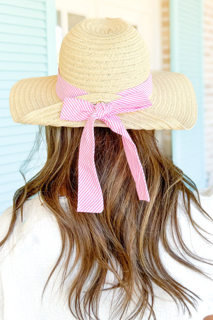pink and white striped ribbon detailed straw hat