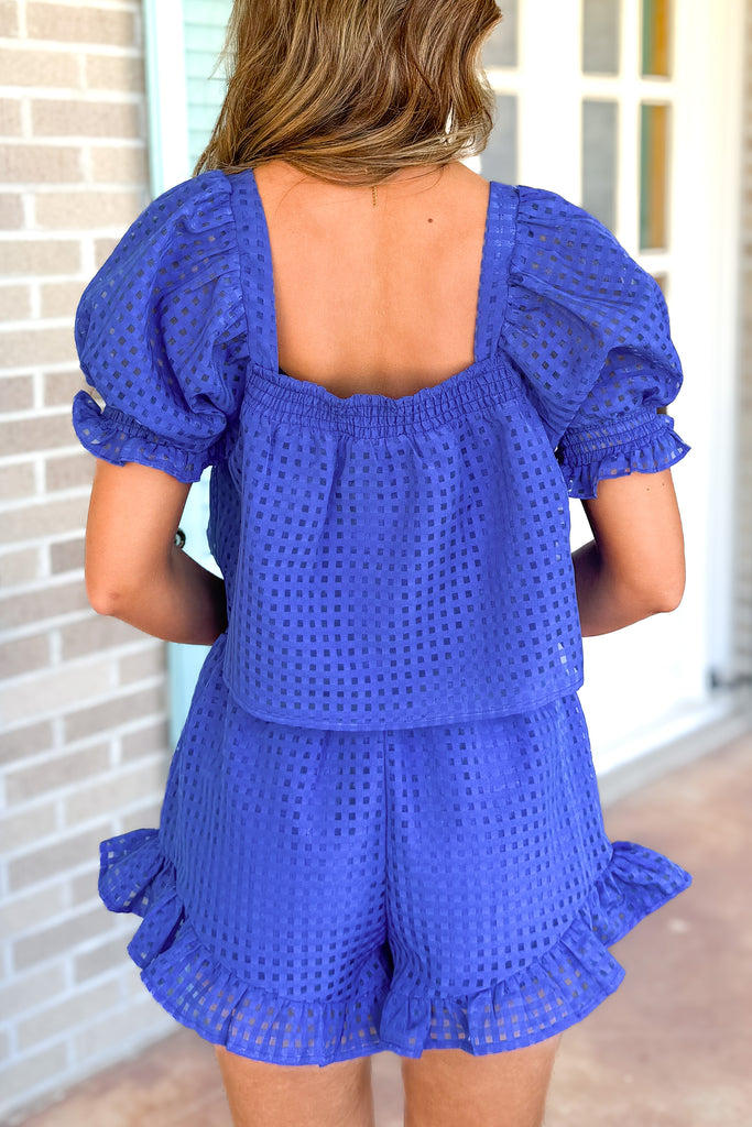 back of puff sleeve blouse