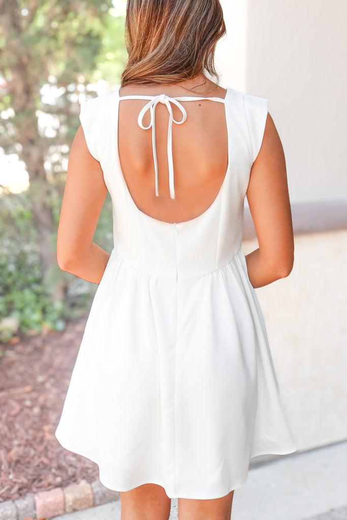 open back of mini dress