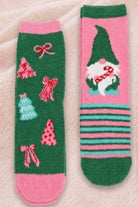 Feeling Fuzzy Gnome Socks in Pink, shown on the right beside the tree socks