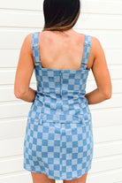 back of checkered denim mini dress with belted waist