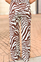 In a Daze Animal Print Flowy Pants in Brown - back view
