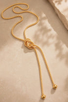 Lots to Love Knotted Lariat Necklace in Gold
