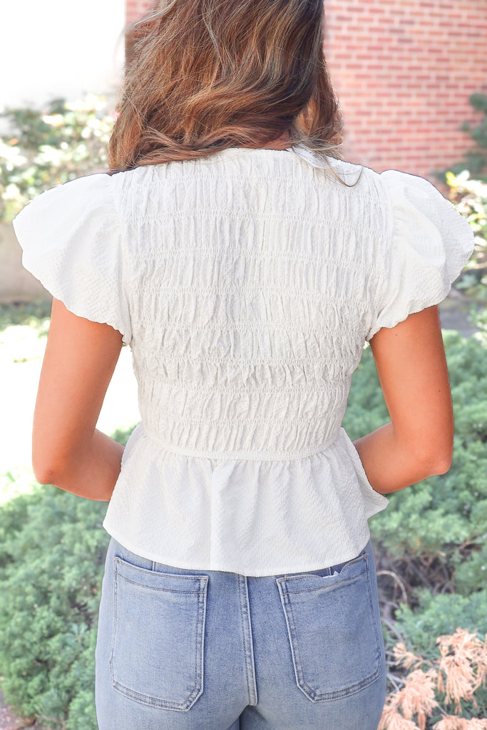 back of peplum top