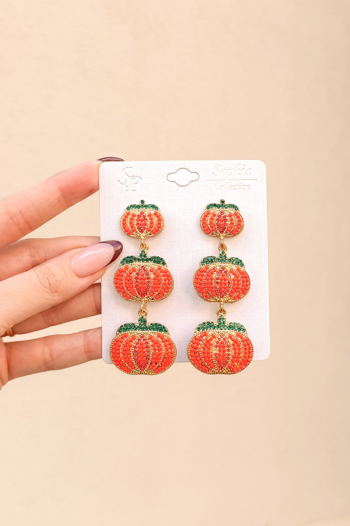 Rhinestone Pumpkin Dangle Earrings in Orange