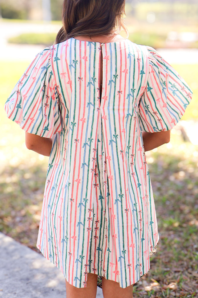 back of multi color bow stripe puff sleeve dress