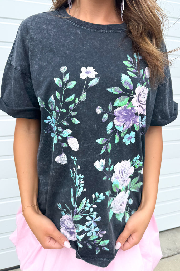 close up of floral graphic tee in black