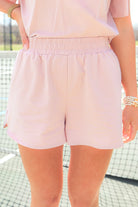 light pink smocked waist lounge shorts