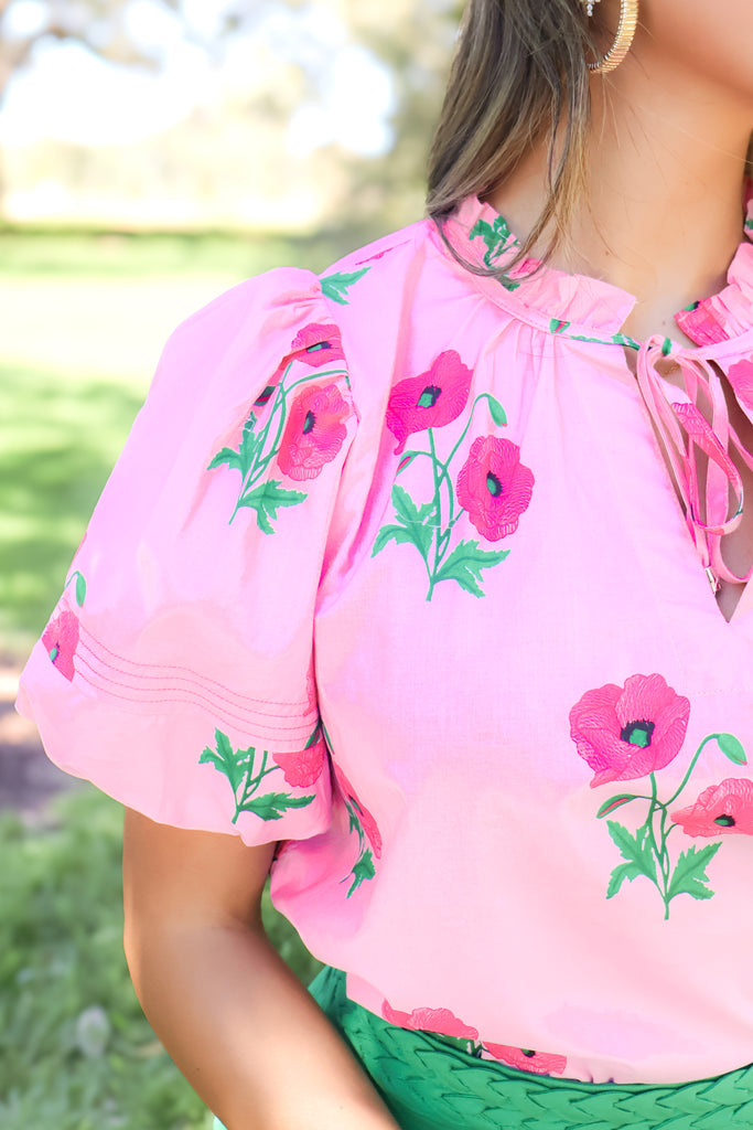 puff sleeve of pink floral tie neck top